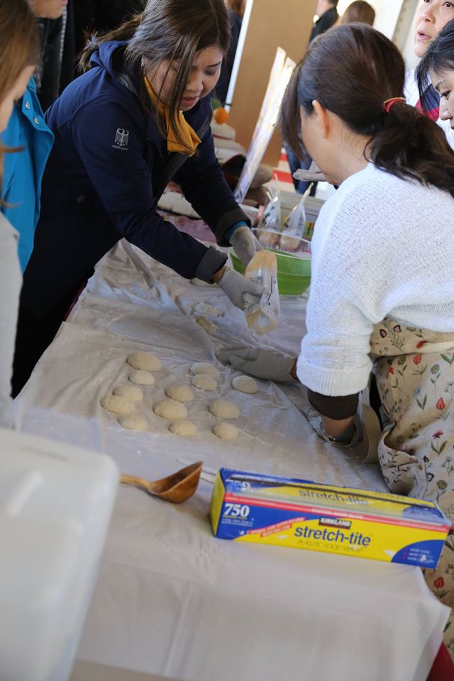 Once the mochi was pounded into a paste, it was then shaped into these cakes. Photo credit James Tokishi