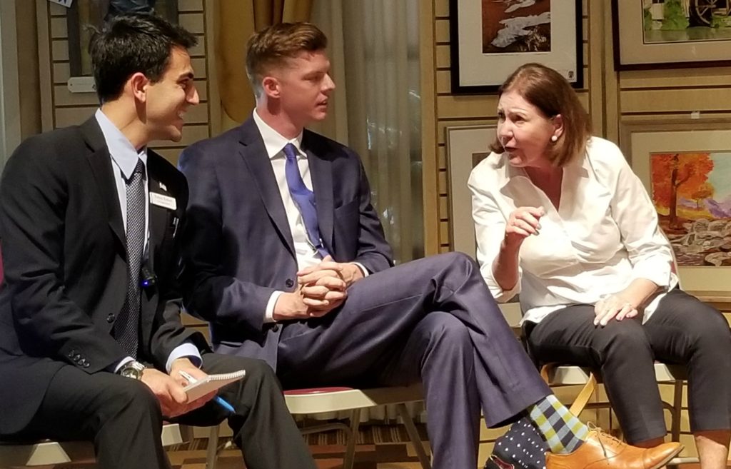 Yahya Yuksel, Billy Kovacs and Ann Kirkpatrick chat at the May 18 candidates forum.