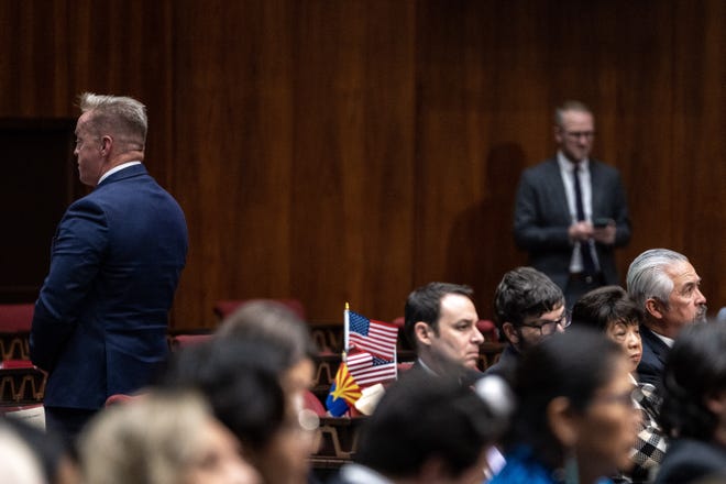 Republican state Sen. Anthony Kern turns his back as Katie Hobbs delivers her State of the State address to the Arizona House of Representatives during the opening session of the 56th Legislature on Jan. 9, 2023, in Phoenix.